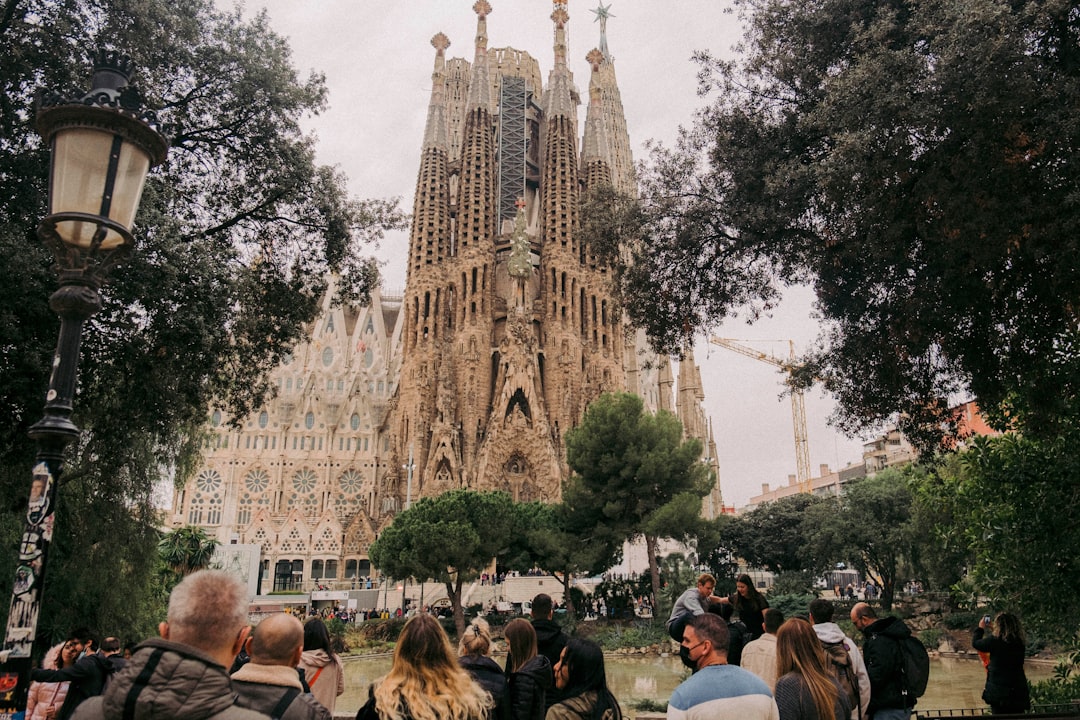 Sagrada Familia basilica towers rising against a blue Barcelona sky