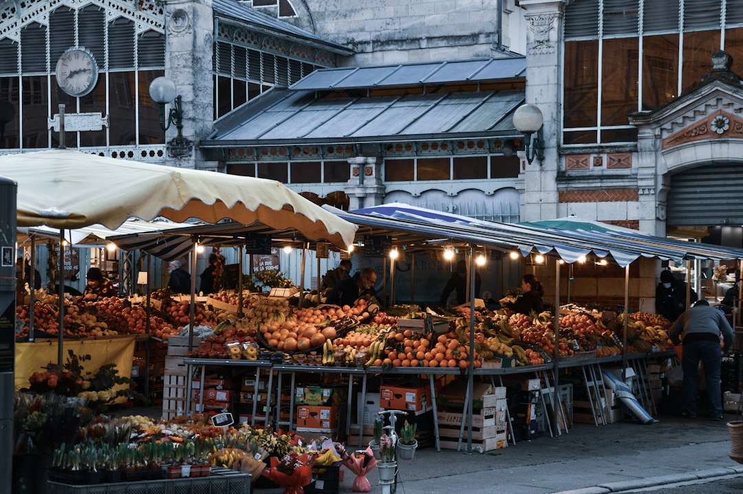 Interior of a covered food market with produce stalls