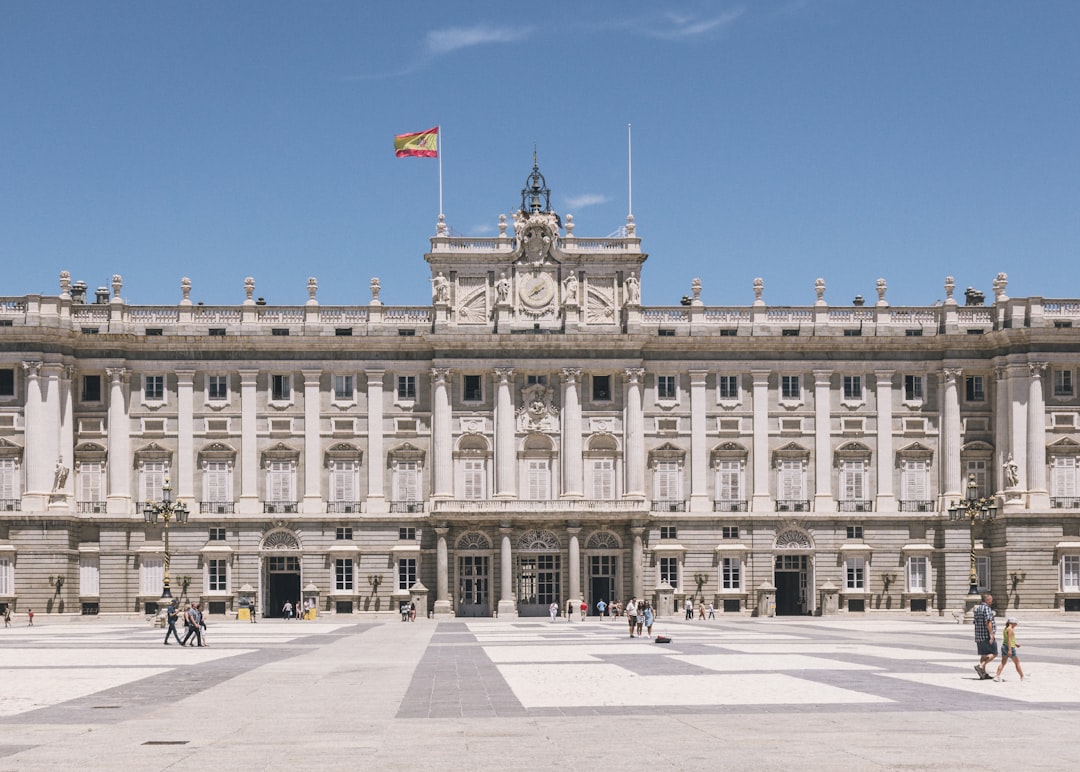 Royal Palace of Madrid facade with blue sky