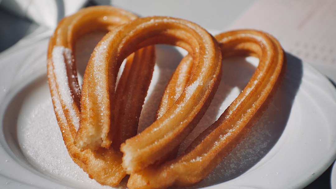 Plate of churros with thick hot chocolate at a Madrid cafe
