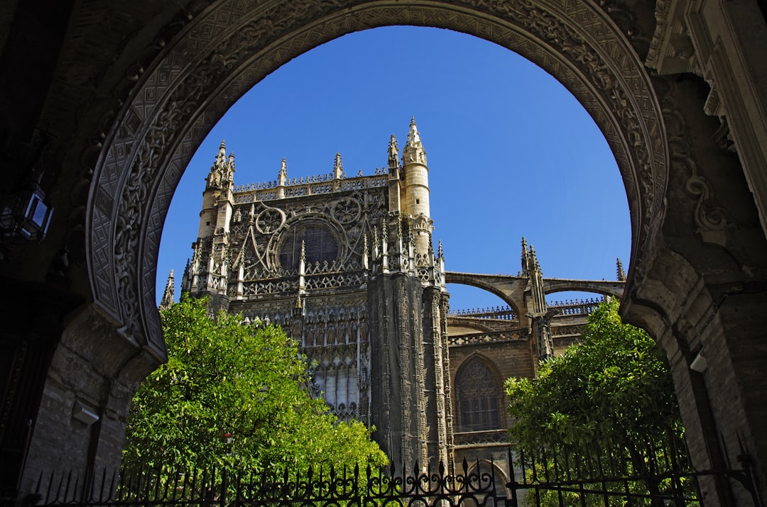 The Giralda bell tower rising above Seville Cathedral at golden hour