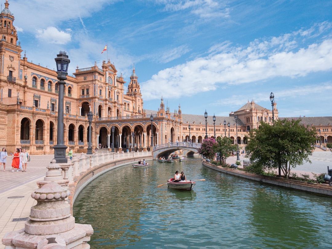 Semicircular Plaza de Espana with bridges and tiled alcoves in Seville