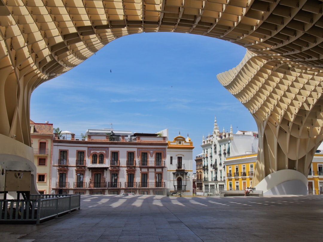 Wavy wooden Metropol Parasol structure against blue sky in Seville