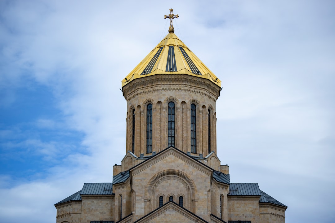 Golden dome of Holy Trinity Sameba Cathedral rising above Tbilisi